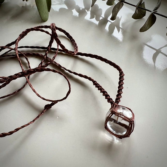 clear quartz sphere talisman (brown)