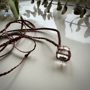 clear quartz sphere talisman (brown)